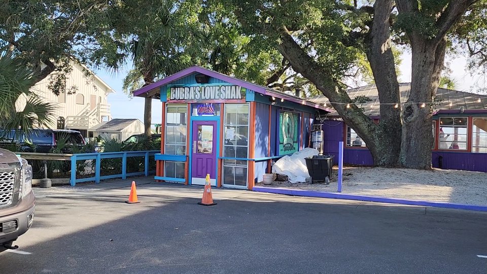 Live music setup inside a colorful grill.